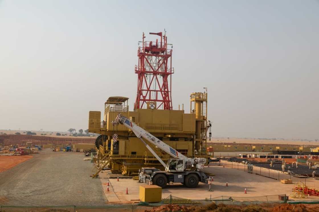 Under construction: An oil well at Murchison Falls National Park in western Uganda, pictured in February this year Under construction: An oil well at Murchison Falls National Park in western Uganda, pictured in February this year