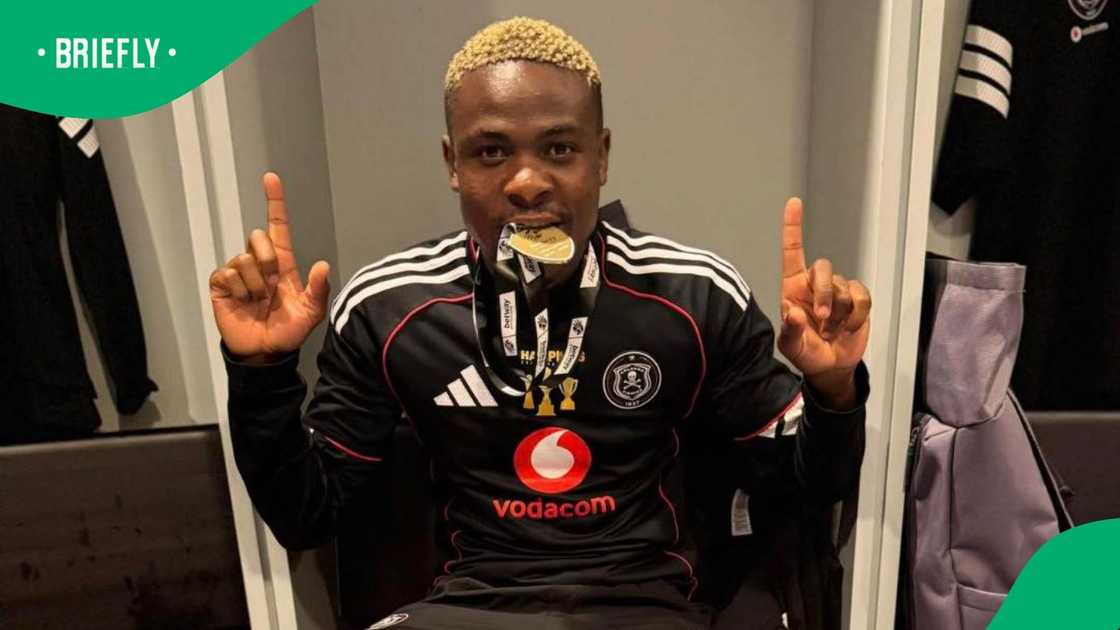 Daniel Msendami celebrating Orlando Pirates title