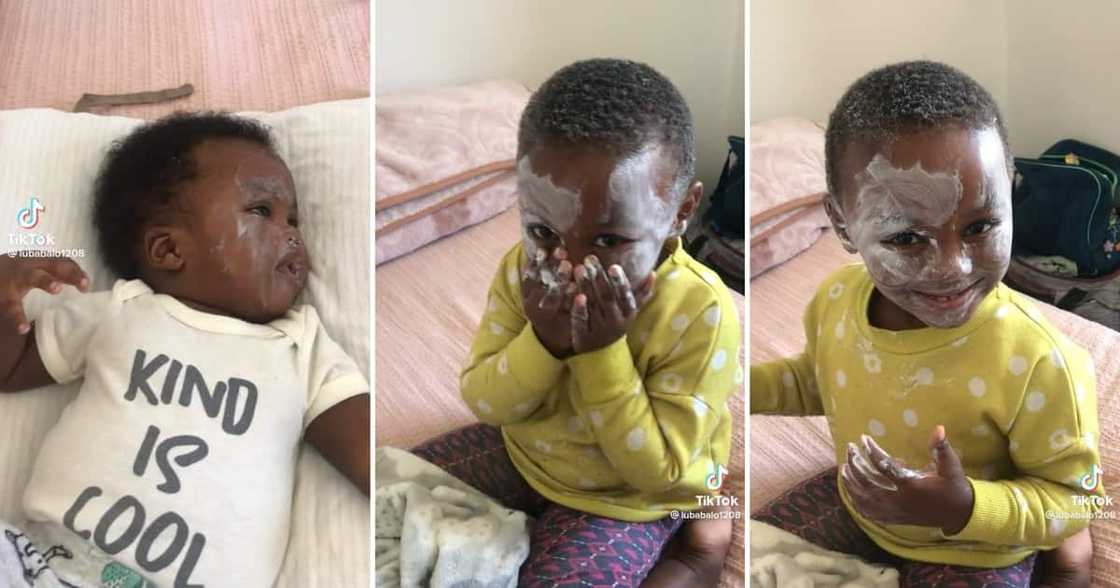 Toddler with her infant brother Toddler with her infant brother