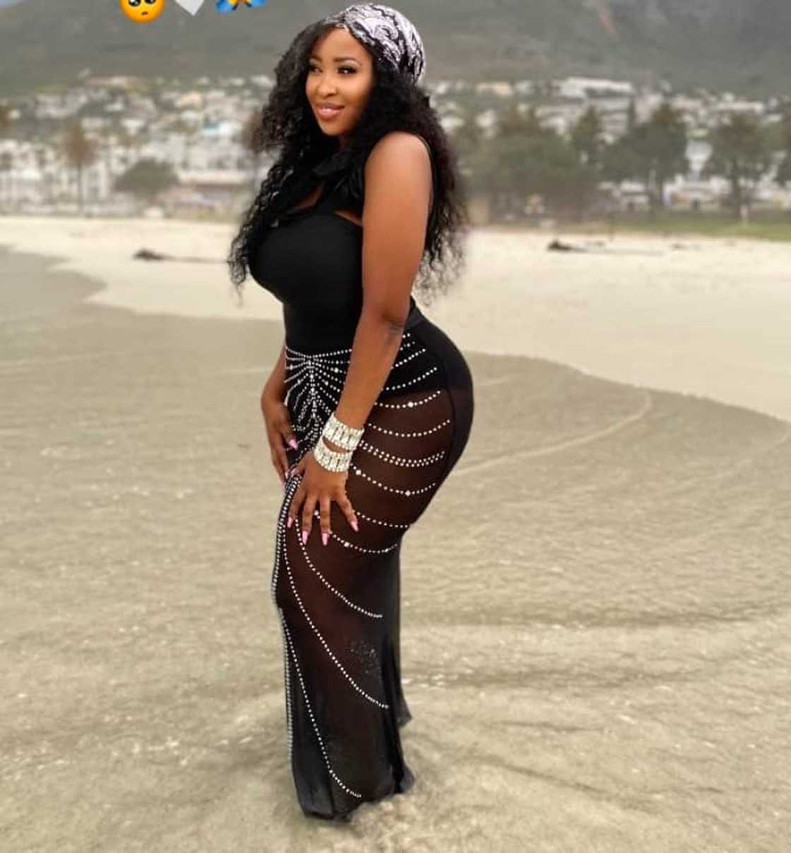 Woman flaunts modest beach style. Woman flaunts modest beach style.