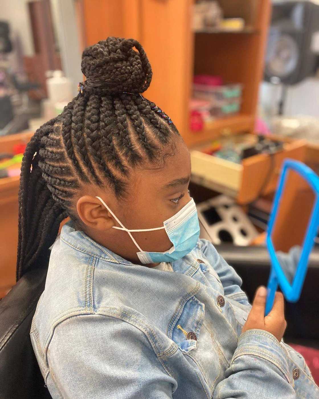 Half pony half mohawk cornrows Half pony half mohawk cornrows