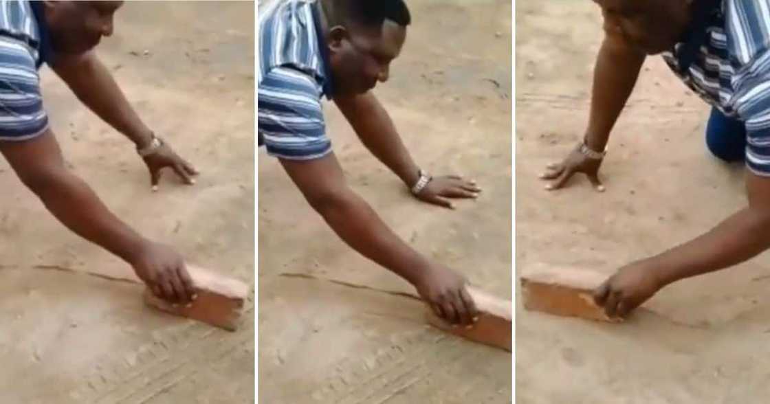 Old man plays with brick as a toy car.