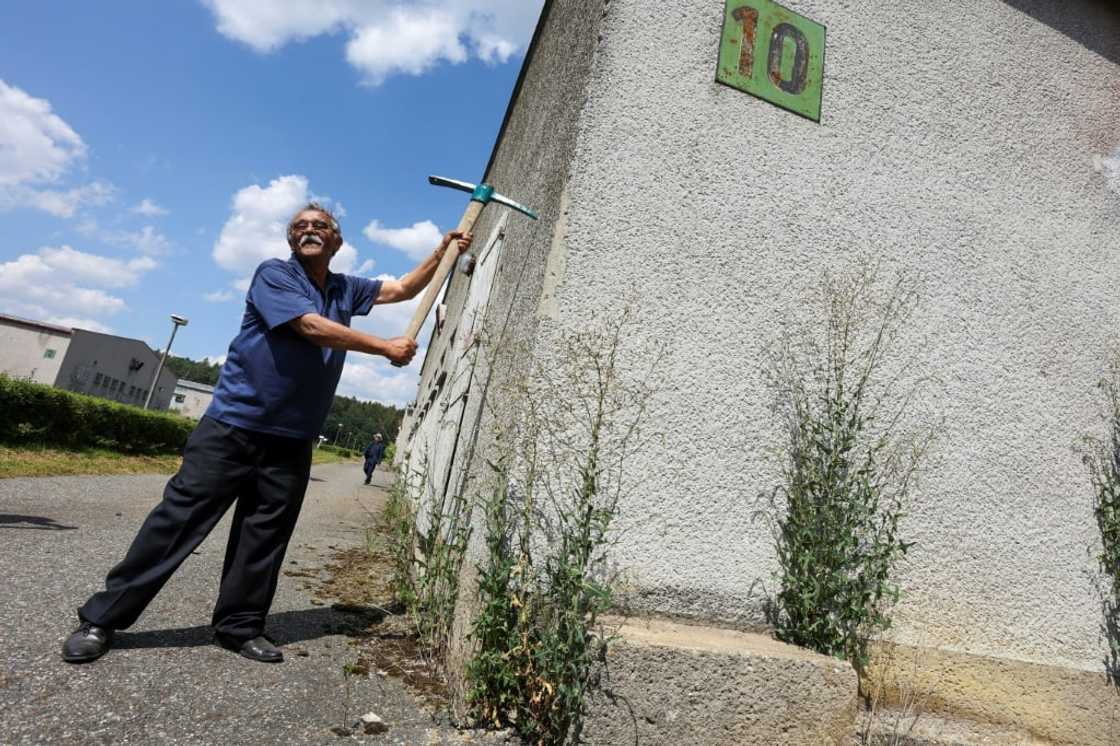 Cenek Ruzicka, whose mother was a Lety survivor, took a pickaxe to one of the farm buildings