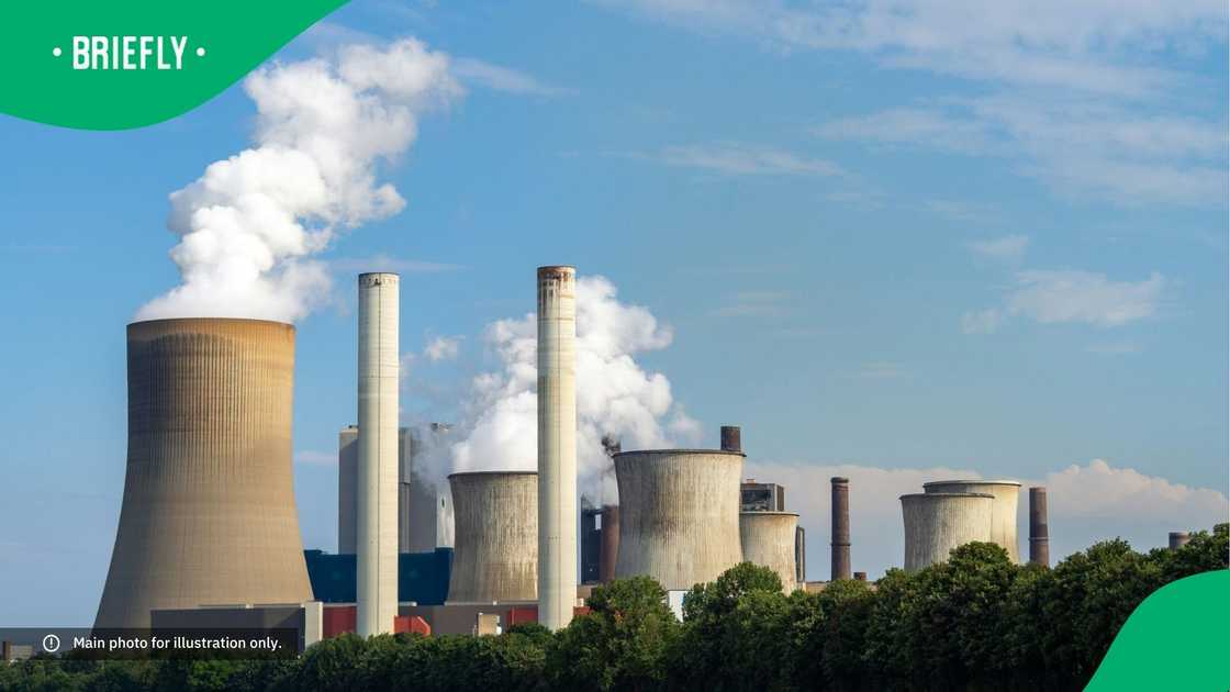 A picture of a power plant. A picture of a power plant.