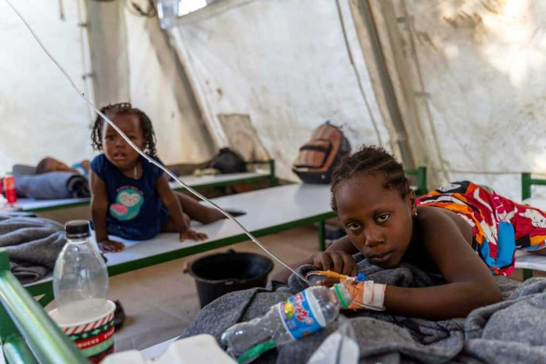 Children suffering from cholera symptoms receive care at a Doctors Without Borders center in the Port-au-Prince district of Cite Soleil on October 7, 2022 Children suffering from cholera symptoms receive care at a Doctors Without Borders center in the Port-au-Prince district of Cite Soleil on October 7, 2022