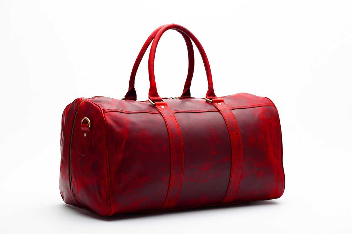 A red leather duffel bag. A red leather duffel bag.