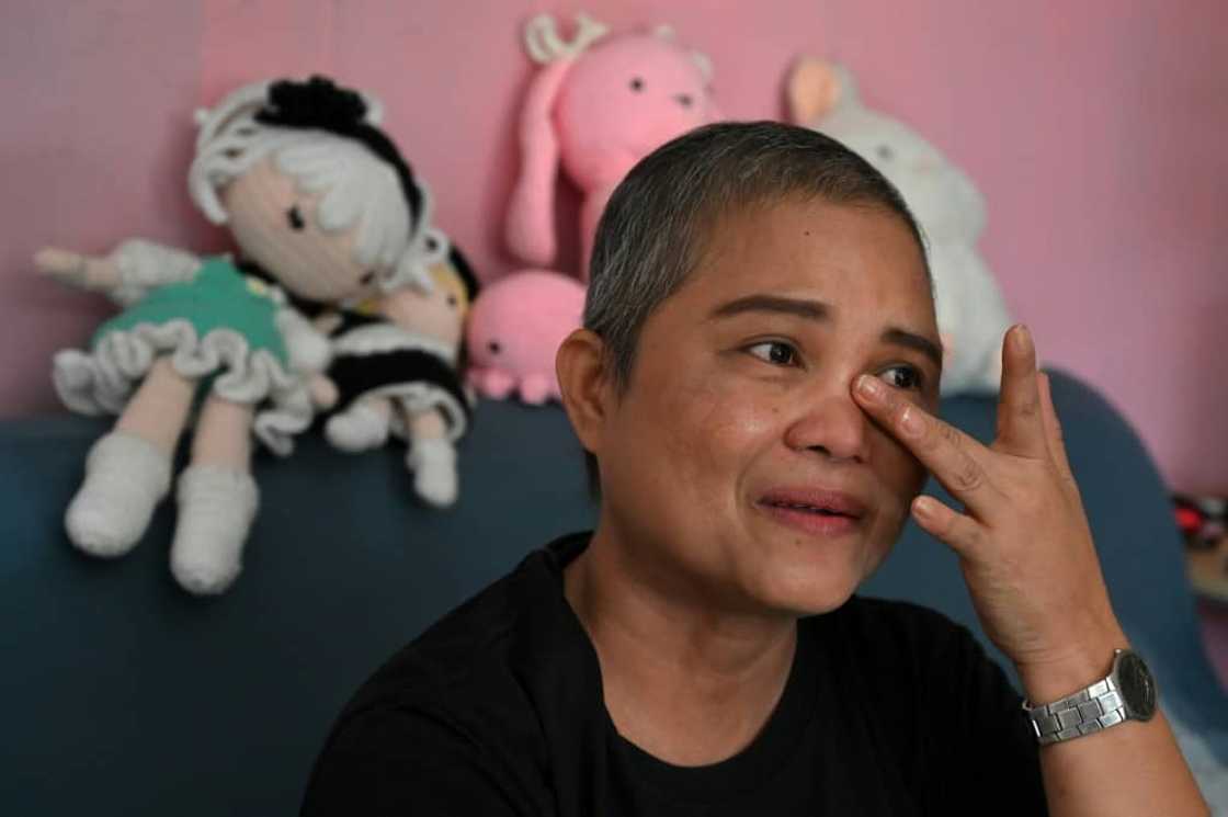 Mary Ann Eduarte told AFP she was spending about $900 a month on bogus cancer cures advertised on Facebook and YouTube Mary Ann Eduarte told AFP she was spending about $900 a month on bogus cancer cures advertised on Facebook and YouTube