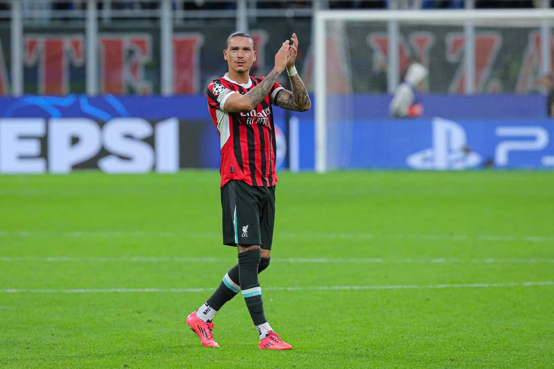 Darwin Nunez wearing an AC Milan shirt at Stadio San Siro Darwin Nunez wearing an AC Milan shirt at Stadio San Siro