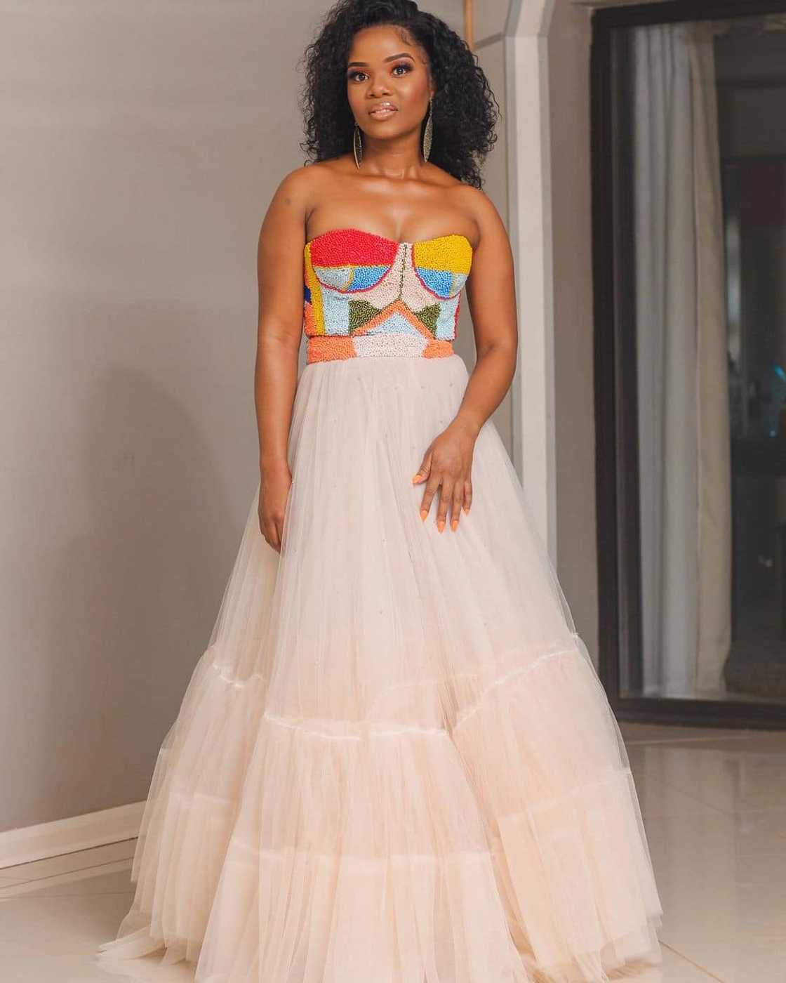 Lacy white with hints of beaded work Lacy white with hints of beaded work