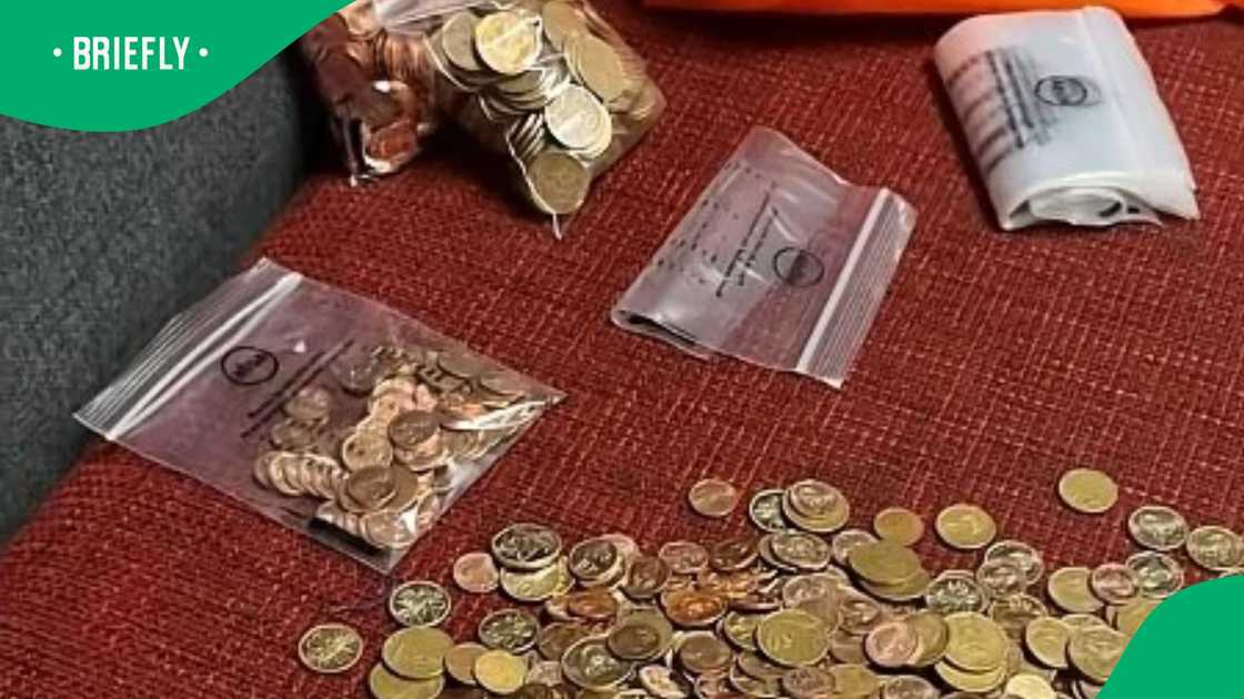 Woman takes her loose coins to ABSA Woman takes her loose coins to ABSA