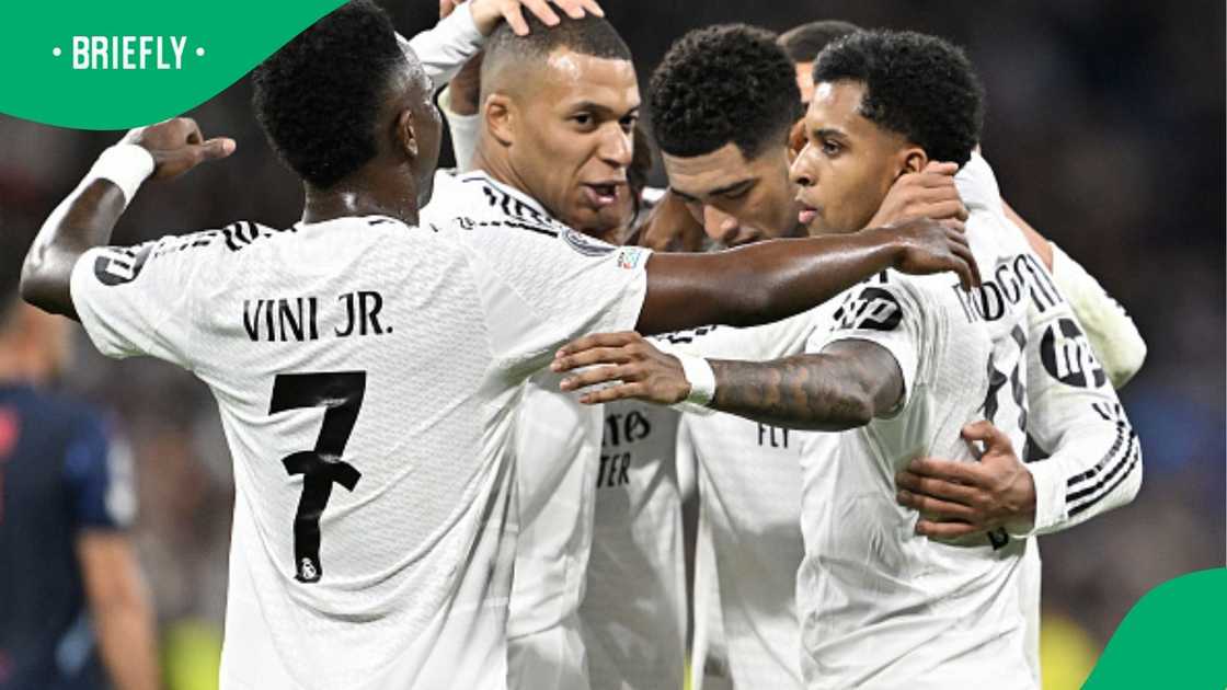 Real Madrid stars celebrate during their clash with RB Salzburg in the UEFA Champions League. Real Madrid stars celebrate during their clash with RB Salzburg in the UEFA Champions League.