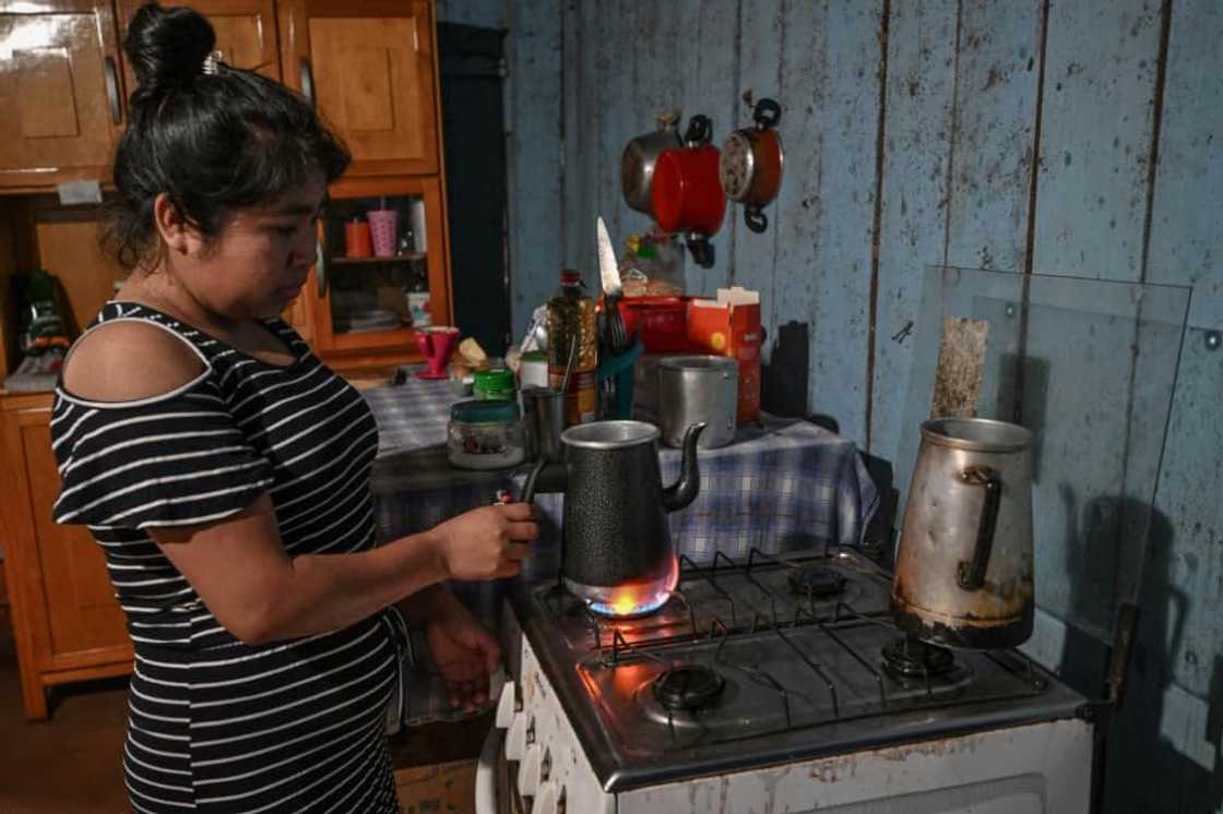 Daniela Acosta, one of the few Ava Guarani with a paying job, takes a bus every day at 2:30 am to work in a poultry processing plant -- but still struggles to buy food Daniela Acosta, one of the few Ava Guarani with a paying job, takes a bus every day at 2:30 am to work in a poultry processing plant -- but still struggles to buy food