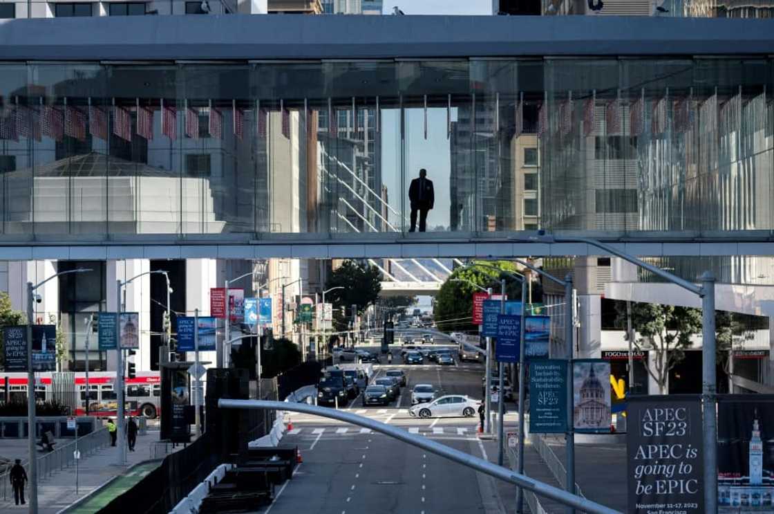 Security personnel stand on a walkway at the Moscone Center, during the first day of the Asia-Pacific Economic Cooperation (APEC) Leaders' Meeting in San Francisco, California, on November 11, 2023