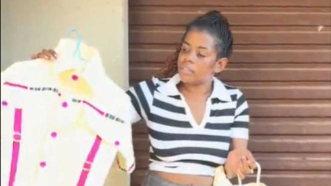 Woman makes clothes in her business Fufu Design
