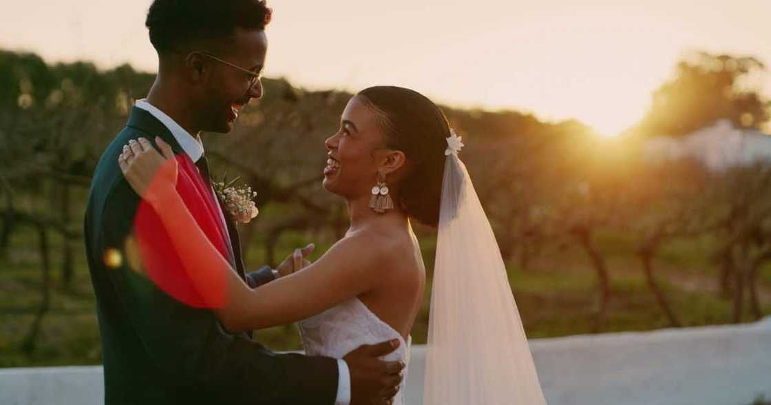 Couple entertain guests at their wedding.