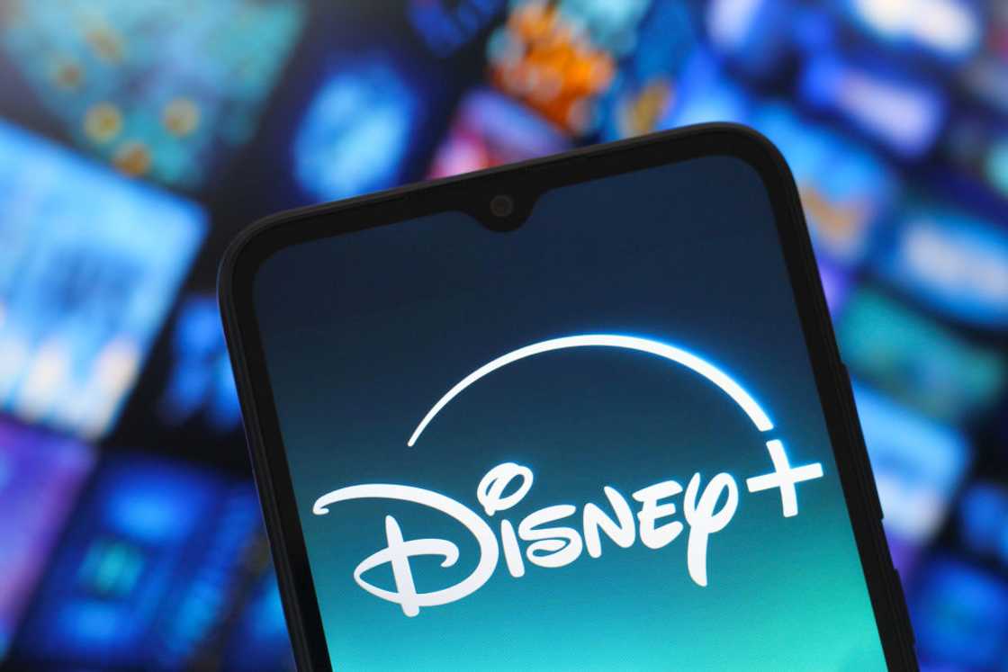 Disney Plus logo displayed on a smartphone screen Disney Plus logo displayed on a smartphone screen