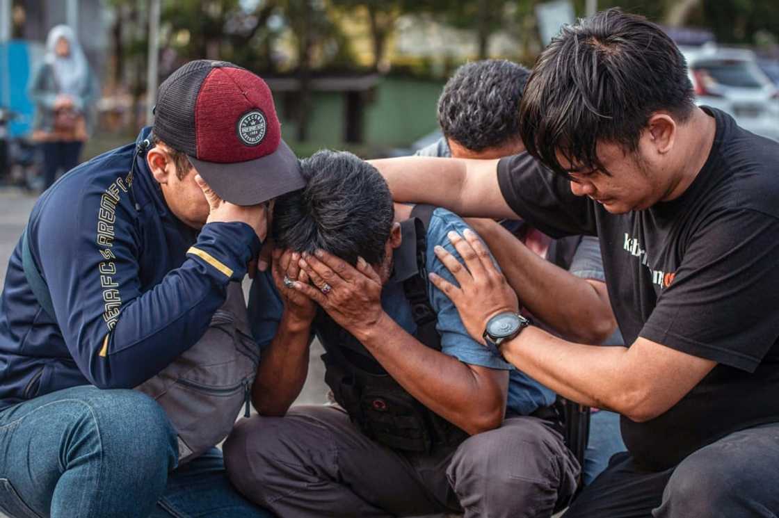 Indonesia's president arrived in Malang as anger grew against the police response to a pitch invasion Indonesia's president arrived in Malang as anger grew against the police response to a pitch invasion