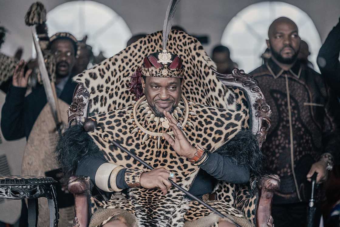 Zulu King Misuzulu kaZwelithini gestures to supporters as they gather to commemorate King Shaka's Day Celebration near the grave of late Zulu King Shaka at Kwadukuza, north of Durban, on September 24, 2025