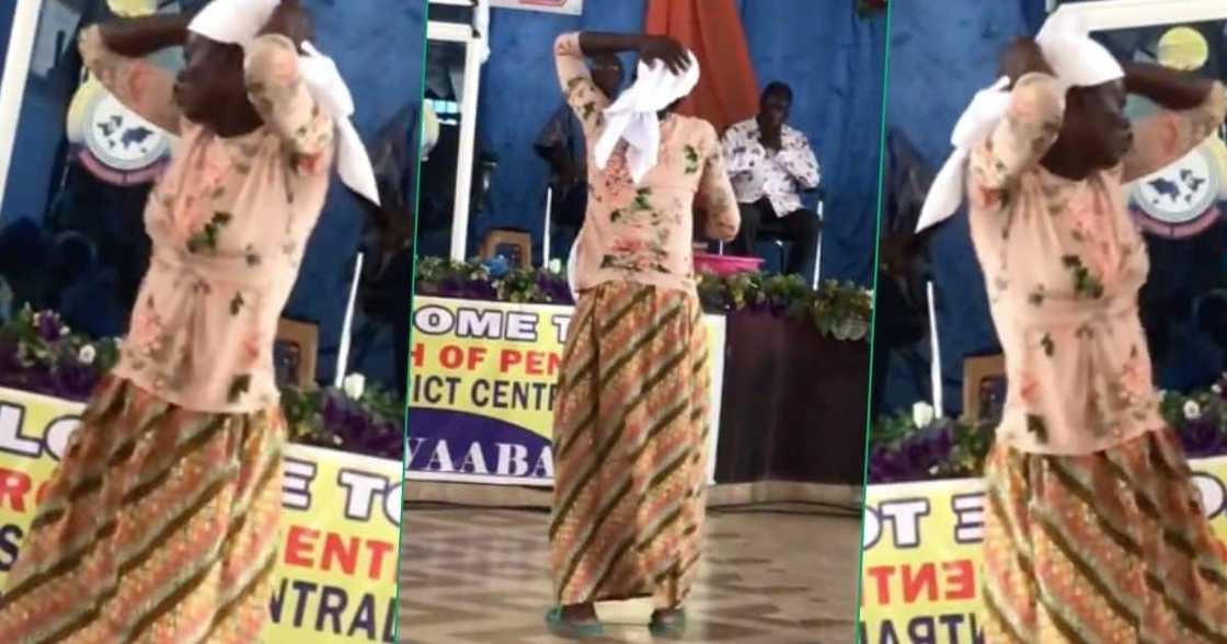 A lady dancing alone in front of the whole church