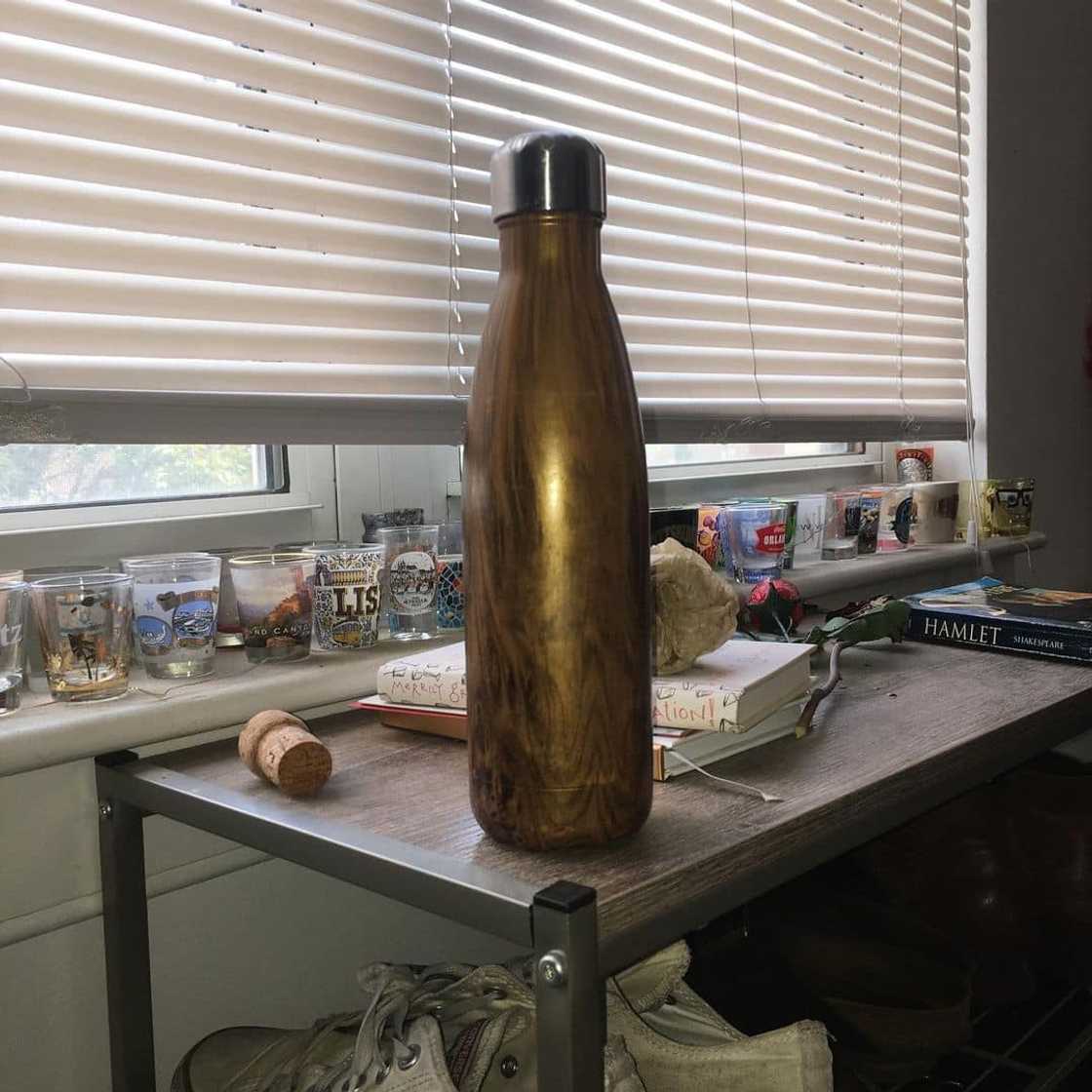 A brown water bottle A brown water bottle