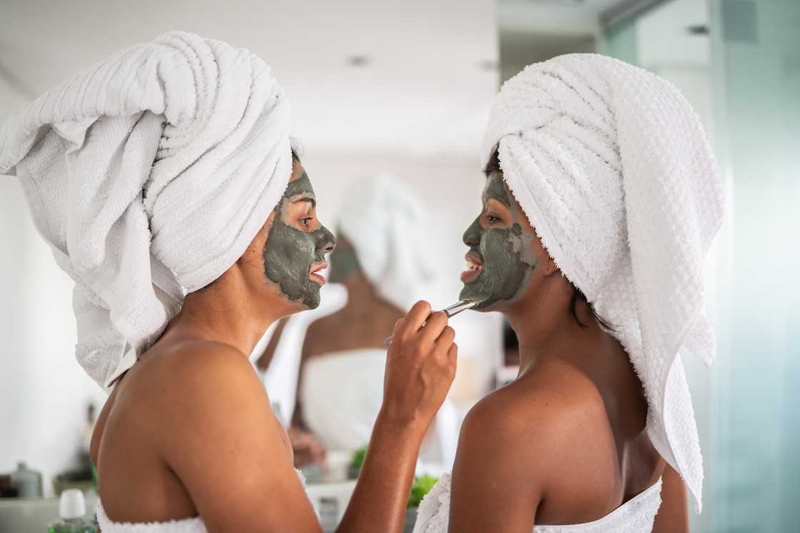 Two ladies having facial at home Two ladies having facial at home
