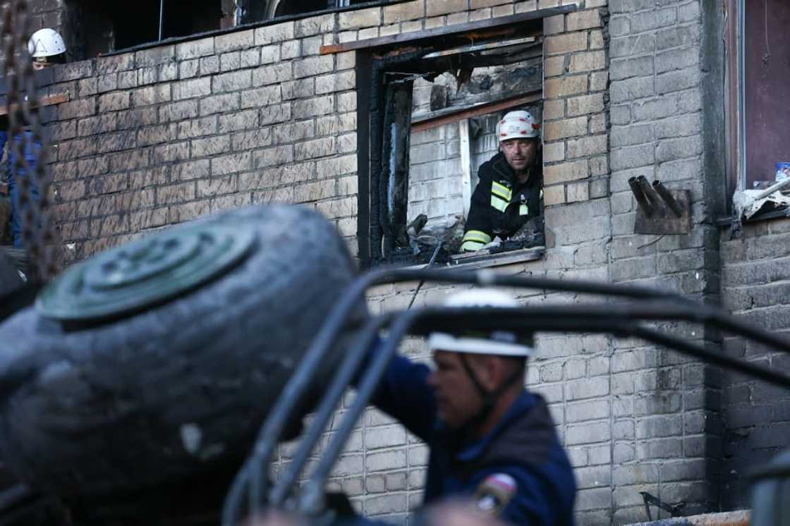 Russian emergency services remove the wreckage of a Sukhoi Su-34 military jet after it crashed in the town of Yeysk in southwestern Russia Russian emergency services remove the wreckage of a Sukhoi Su-34 military jet after it crashed in the town of Yeysk in southwestern Russia