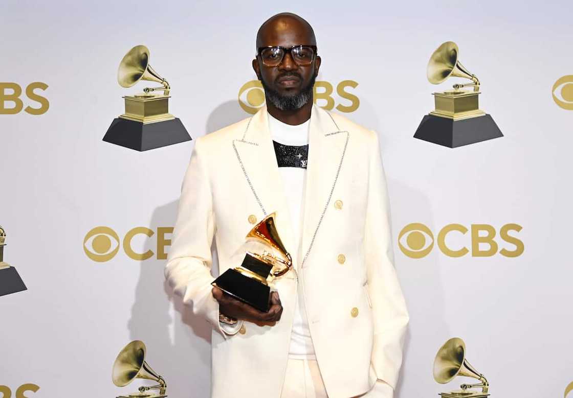 Black Coffee posing with an award Black Coffee posing with an award