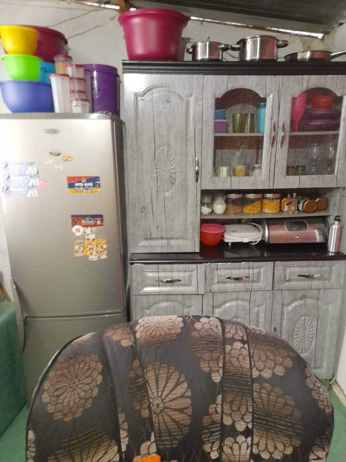 Woman shows her kitchen. Woman shows her kitchen.