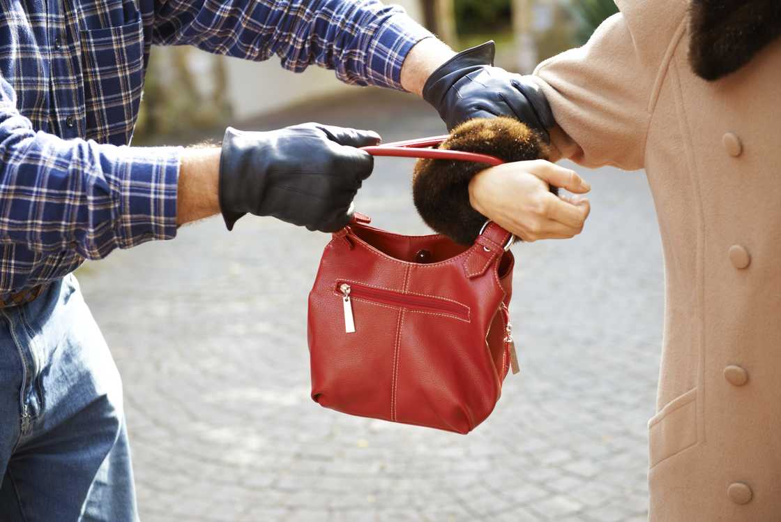 A woman was mugged on the street A woman was mugged on the street