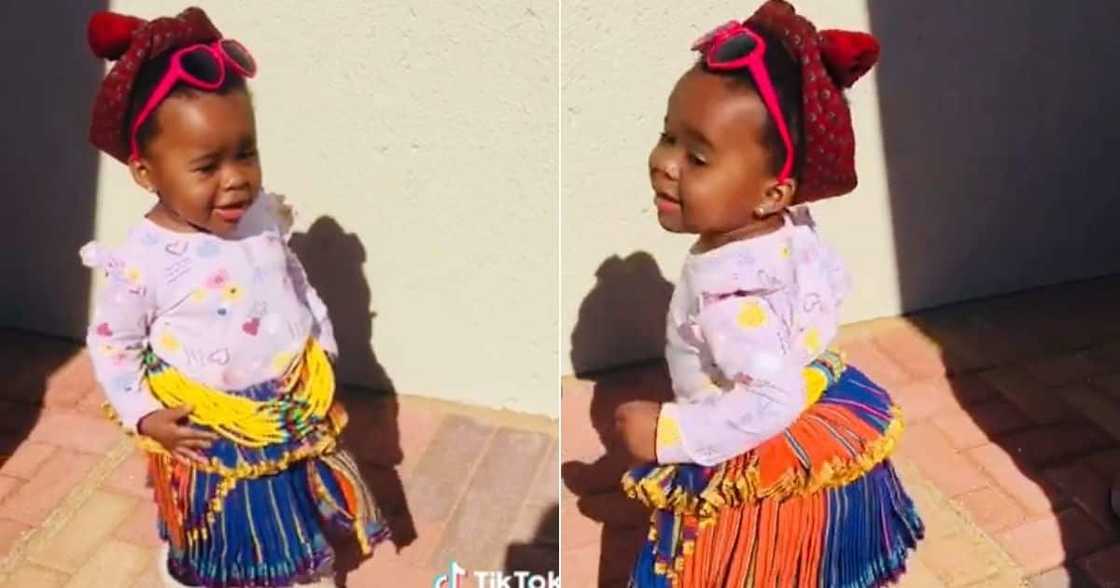 Tsong toddler wears xibelani and dances