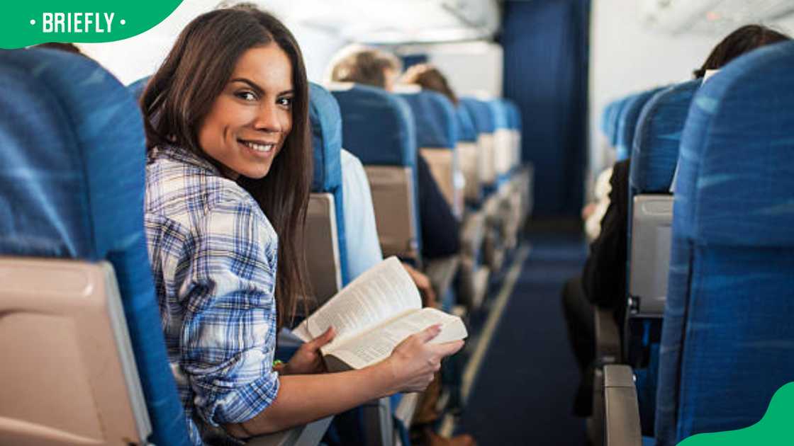 A traveller on a plane A traveller on a plane