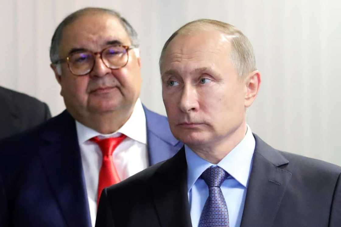 Heavily sanctioned Russian billionaire Alisher Usmanov (L) is close to President Vladimir Putin(R) Heavily sanctioned Russian billionaire Alisher Usmanov (L) is close to President Vladimir Putin(R)