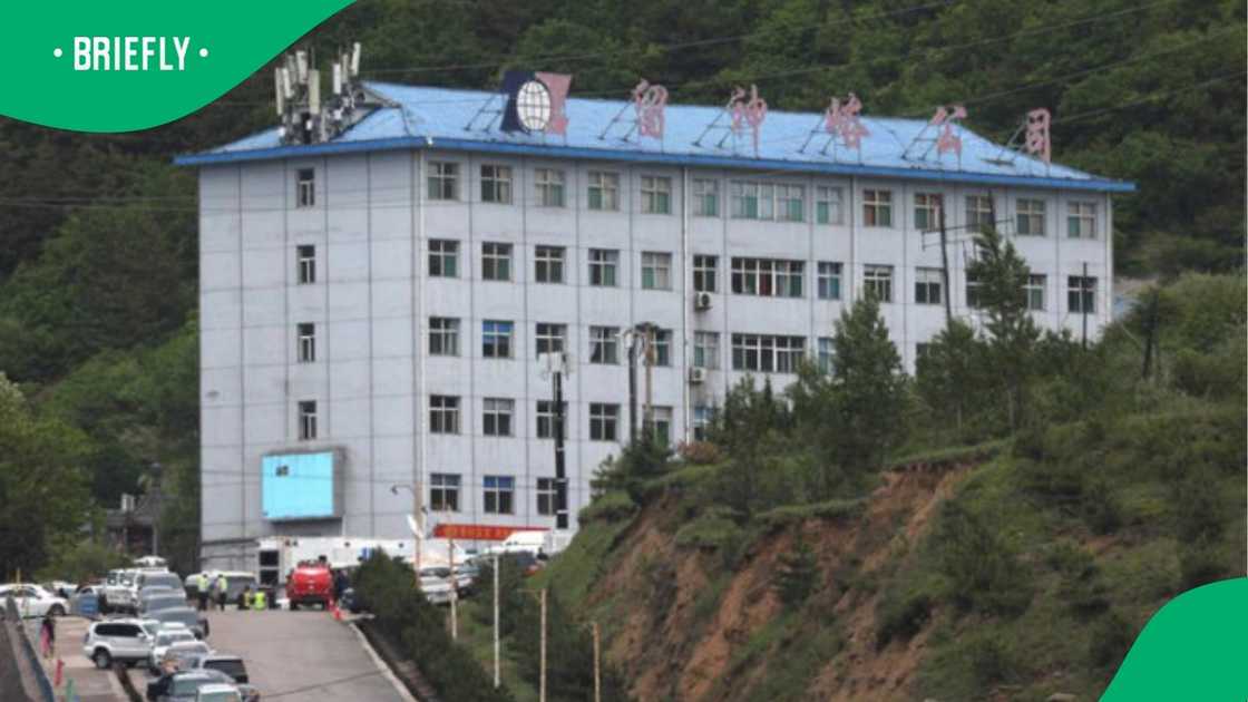 Medical staff worked to assist survivors at a hospital in China following the devastating coal mine explosion in Qinyuan county