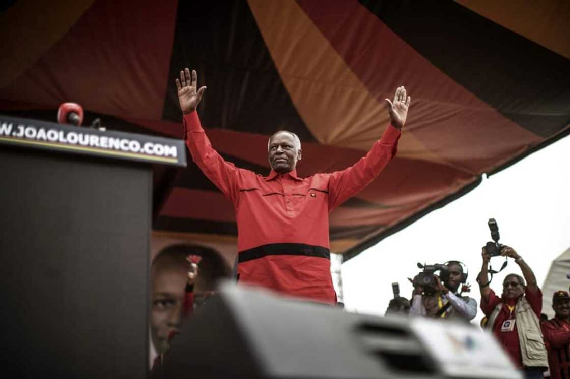 President Jose Eduardo dos Santos acknowledges the crowd at a 2017  campaign rally in Luanda President Jose Eduardo dos Santos acknowledges the crowd at a 2017  campaign rally in Luanda