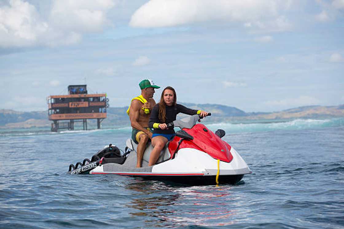 Kelly Slater of the United States of America with his daughter Taylor Wheeler at the Fiji Pro in Tavarua, Fiji.