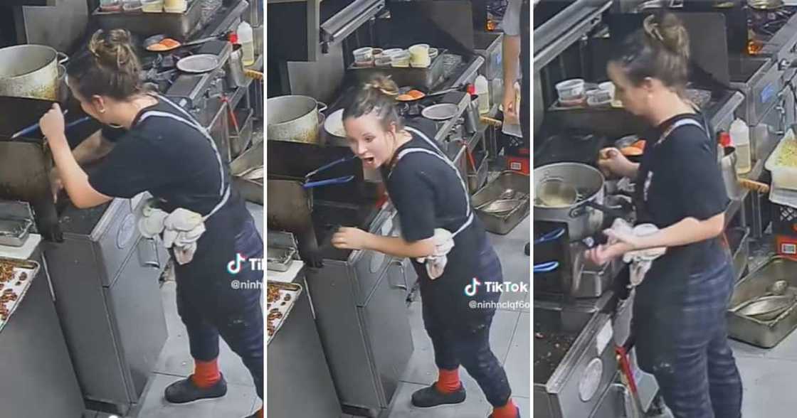 Woman pulling her cellphone from the fryer Woman pulling her cellphone from the fryer