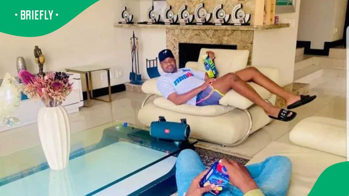 Itu Khune’s impressive car collection sits in a stylish home garage Itu Khune’s impressive car collection sits in a stylish home garage