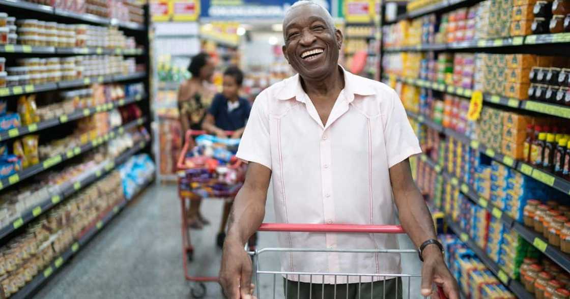 A man was surprised by Keegan Gordon who offered him a trolley of free groceries A man was surprised by Keegan Gordon who offered him a trolley of free groceries