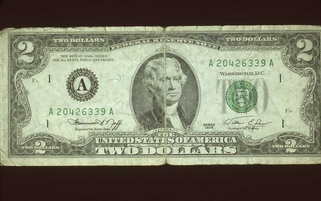 2 dollar bill featuring President Thomas Jefferson.