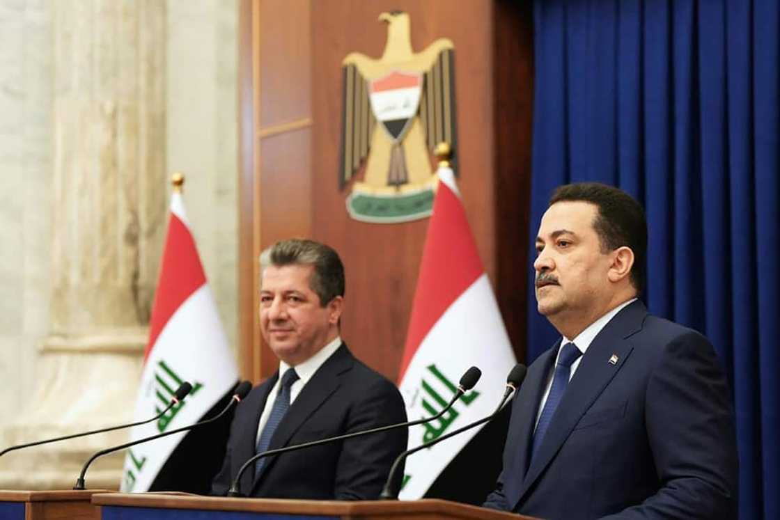 Iraqi Prime Minister Mohammed Shia al-Sudani, on the right, at a joint press conference with his Kurdish counterpart Masrour Barzani in Baghdad