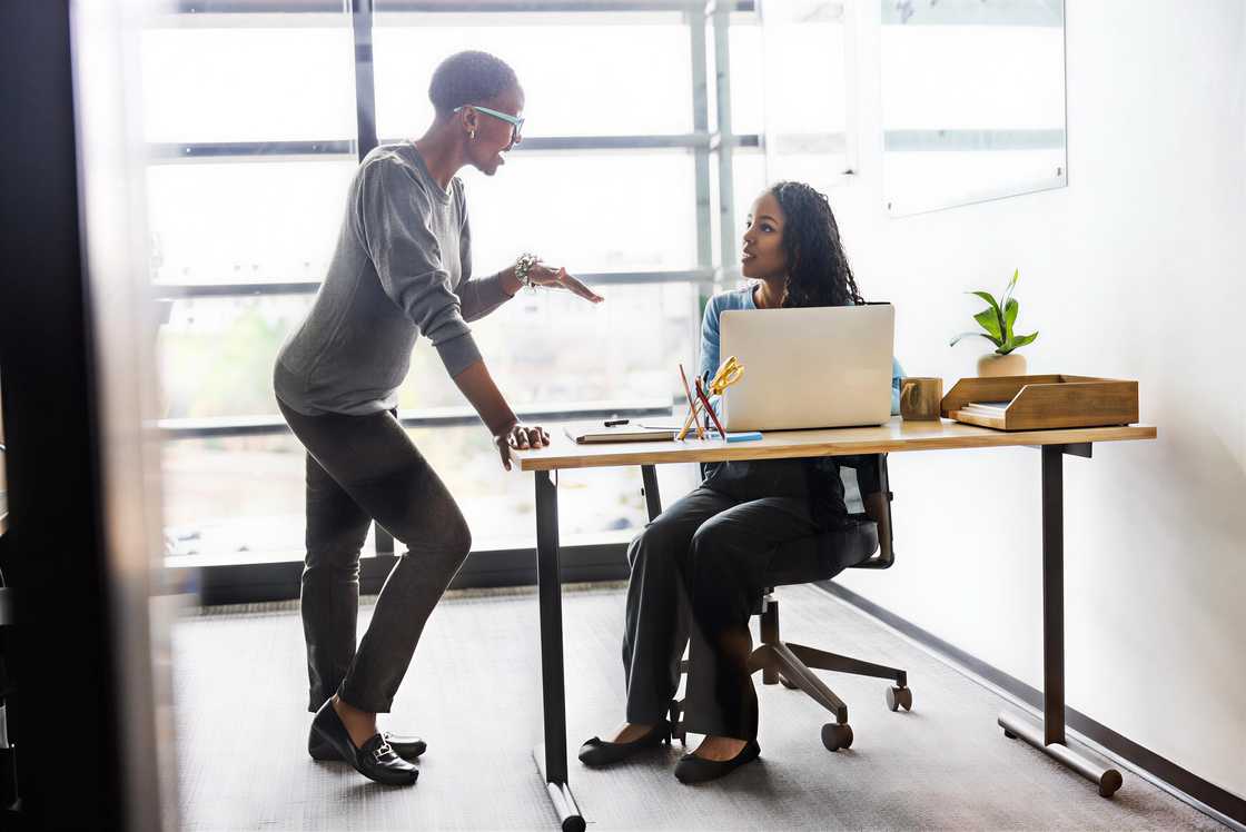 Female colleagues arguing Female colleagues arguing