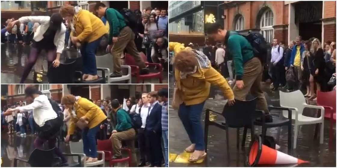 Londoners mounted chairs to cross floodwater. Londoners mounted chairs to cross floodwater.