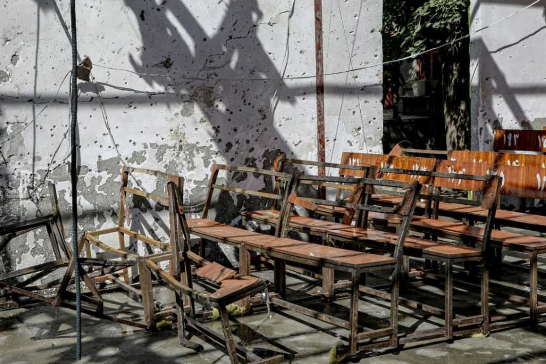 Students said they saw classmates scrabbling to drag each other to safety after the suicide bombing Friday at the women's section of an education centre Students said they saw classmates scrabbling to drag each other to safety after the suicide bombing Friday at the women's section of an education centre