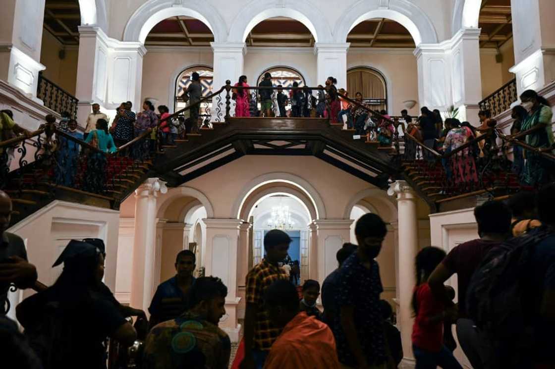 People visit Sri Lankan President Gotabaya Rajapaksa's official residence in Colombo on July 12, 2022, after it was overrun by anti-government protestors on July 9 People visit Sri Lankan President Gotabaya Rajapaksa's official residence in Colombo on July 12, 2022, after it was overrun by anti-government protestors on July 9
