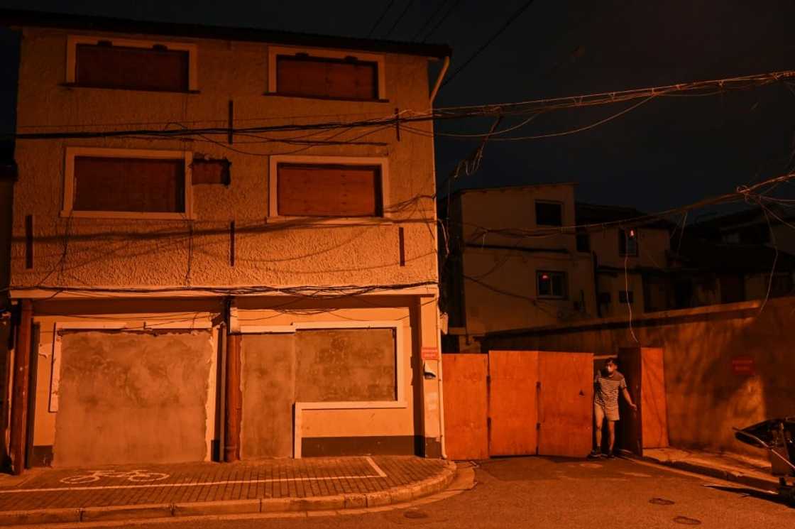 Buildings throughout Shanghai's Laoximen neighbourhood have been sealed and marked for demolition Buildings throughout Shanghai's Laoximen neighbourhood have been sealed and marked for demolition