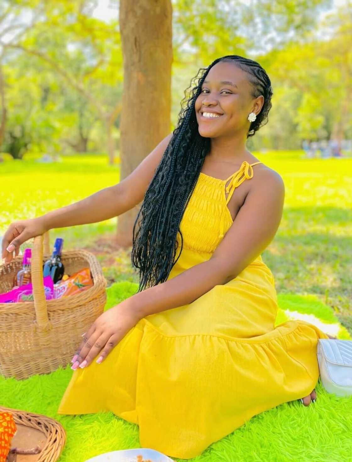 A woman showed off the stash of money she found in her mother's coat while doing laundry. A woman showed off the stash of money she found in her mother's coat while doing laundry.