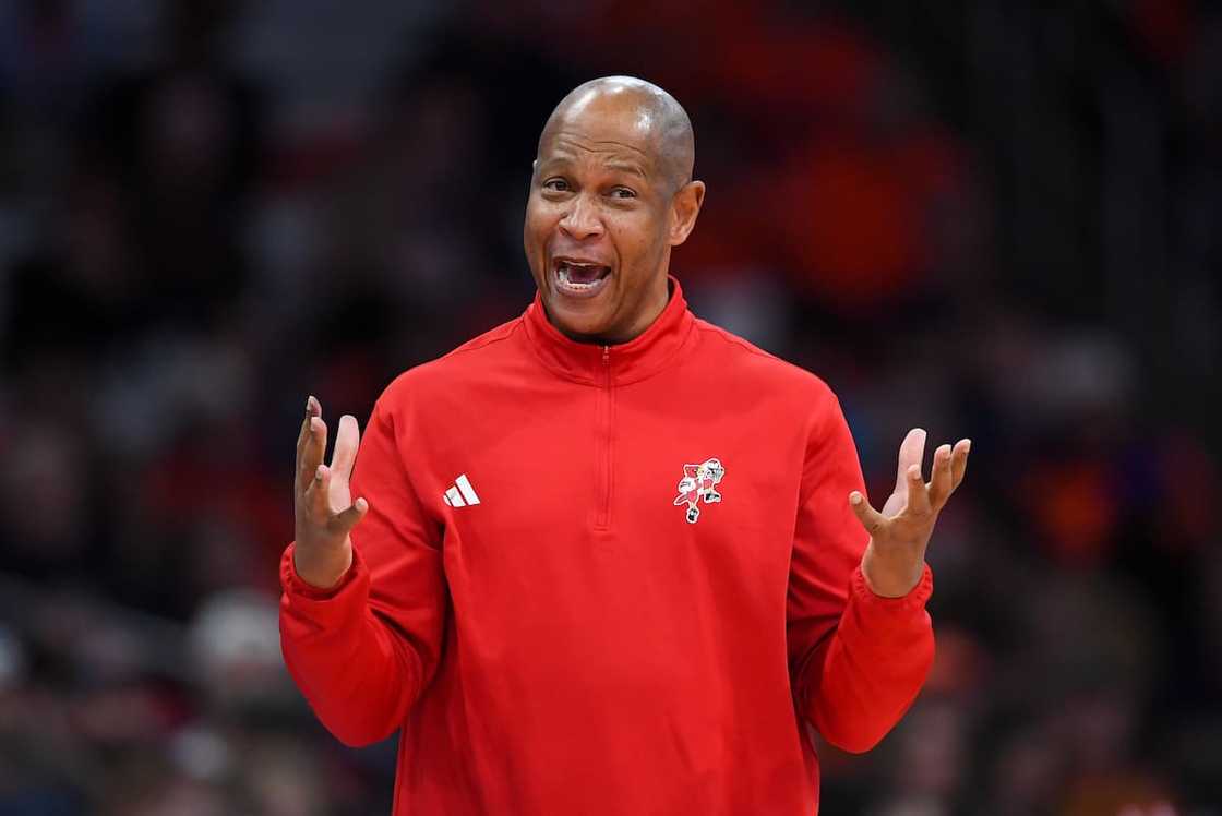 Kenny Payne of the Louisville Cardinals reacts to a call against the Syracuse Orange