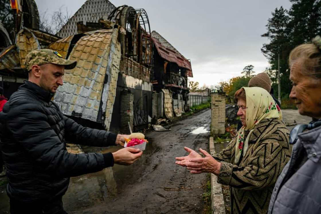 Recently liberated towns are still marked by tensions over what happened during Russian occupation