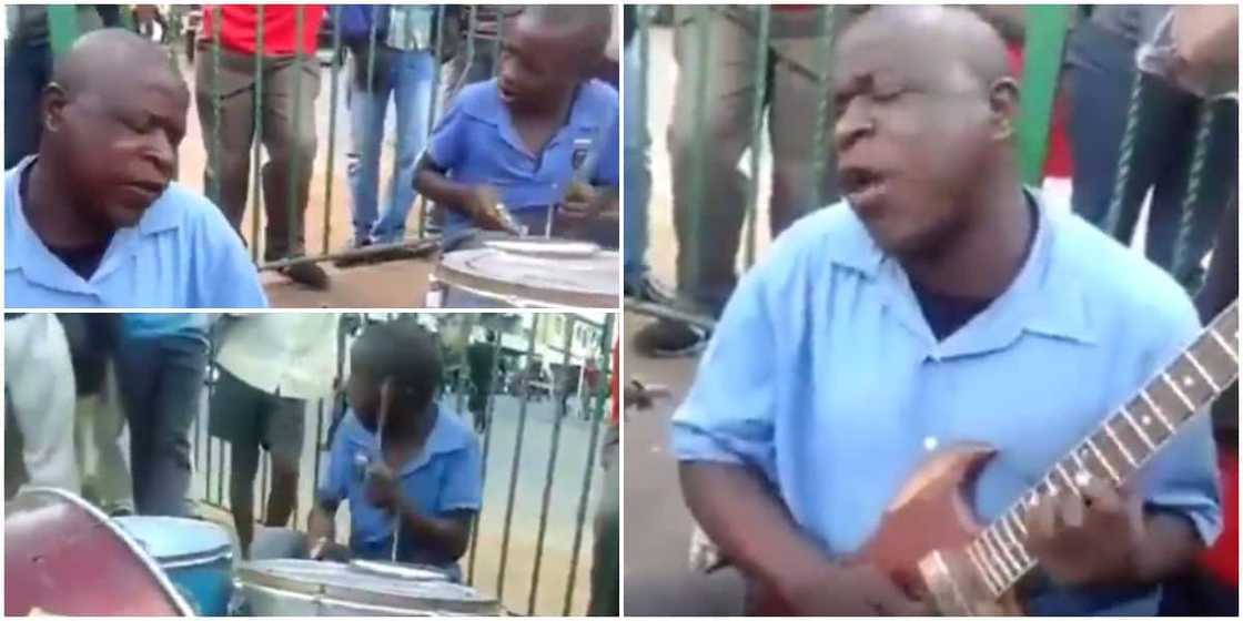Blind father, music, guitarist, drummer, roadside, singing Blind father, music, guitarist, drummer, roadside, singing