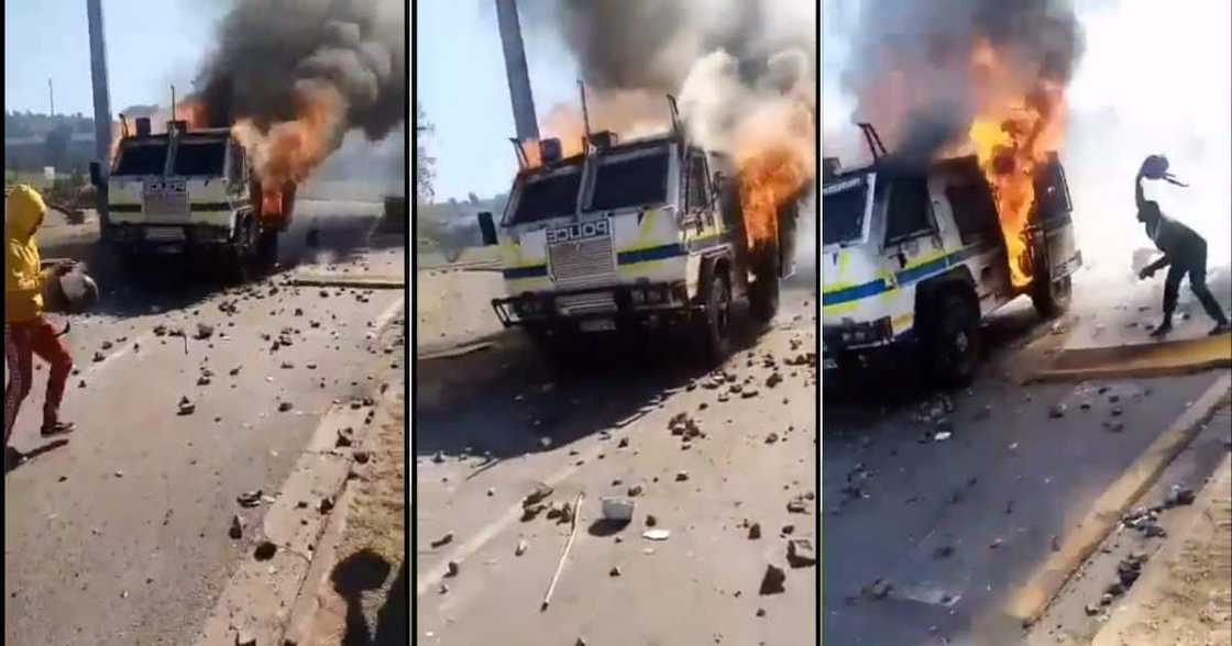 South Africans are shocked to see a police vehicle burned down. Image: Twitter South Africans are shocked to see a police vehicle burned down. Image: Twitter